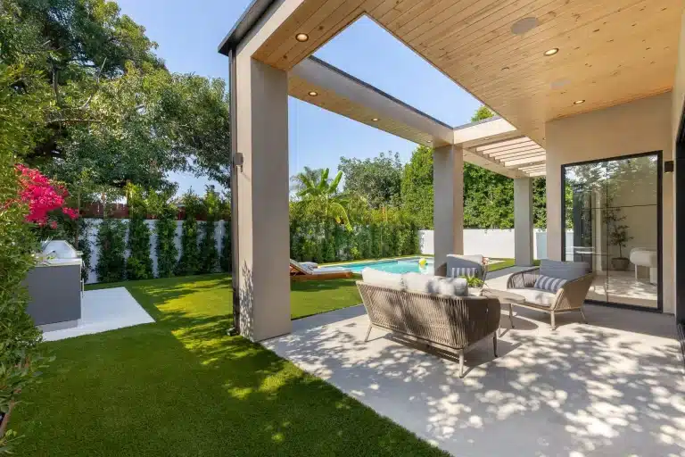 Modern backyard patio with pool and seating