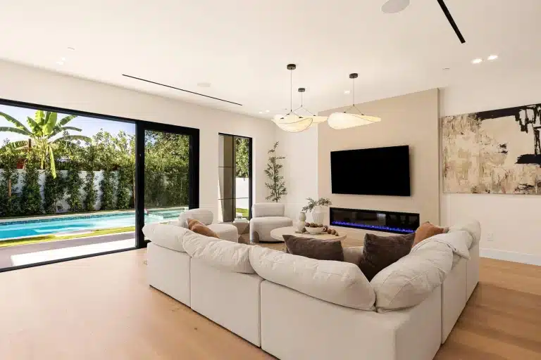 Luxury lounge overlooking backyard pool