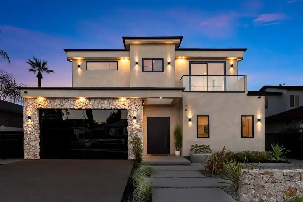 Modern custom home exterior at twilight