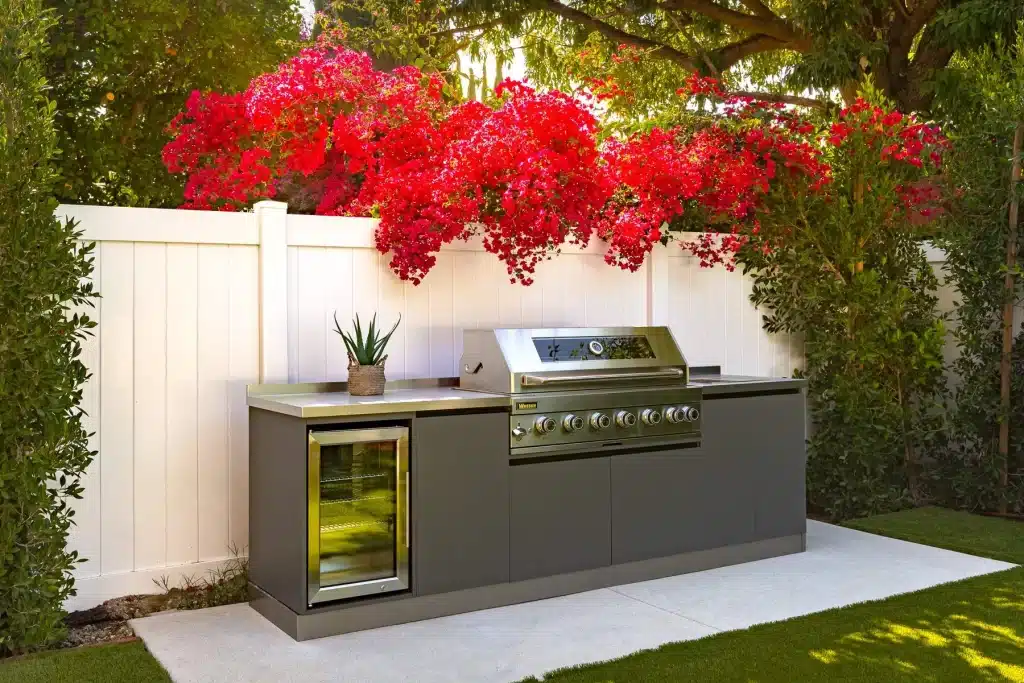 Built-in outdoor kitchen with stainless steel grill
